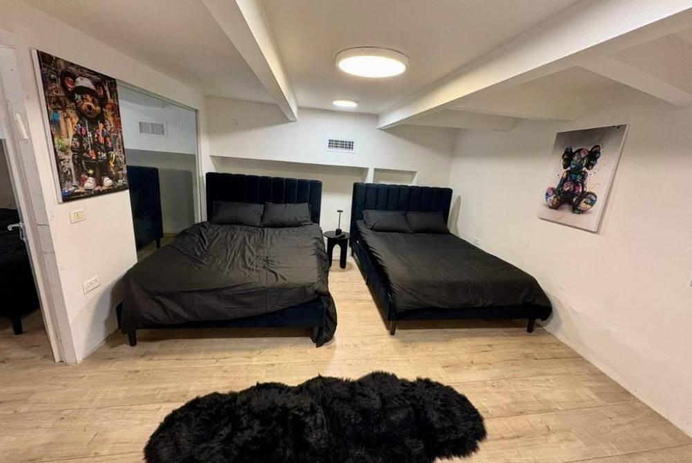 חדרי שינה - סוויטת בוטיק גלרי לנופש רומנטי ומפנק בלב תל אביב 118487